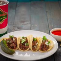 Four Mini Tacos · Four mini tacos with your choice of meat topped with cilantro and onion.
