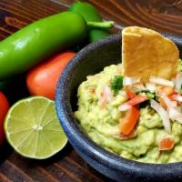 Guacamole  · Fresh made to order guacamole bowl served with tortilla chips. (Guacamole hecho a la orden c...