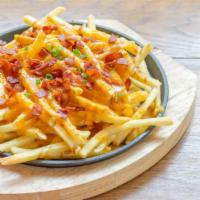 Bacon Cheese Fries · Delicious fries topped with fresh bacon and nacho cheese.