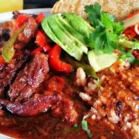 Steak Picado* · Served with rice, beans, fried onions, mexifries and two tortillas.