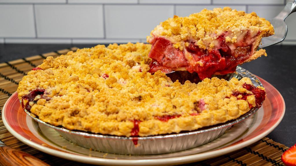 Strawberry Rhubarb Pie · Local Rhubarb and Northwest Strawberries topped with a Brown sugar Crumble.