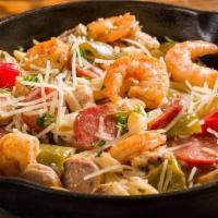 Spicy Born On The Bayou Pasta · Blackened shrimp, chicken, hot Italian and Andoille sausage, garlic, parsley, roasted bell p...