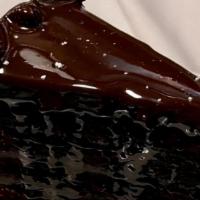 Togo Nine Layer Choc Cake · Layers of rich, moist Devil's food chocolate cake filled with chocolate butter cream. Served...