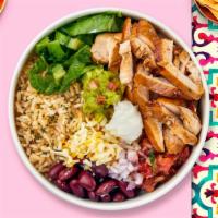 Grilled Chicken Bowl · Adobo marinated grilled chicken served with rice, beans, and your choice of toppings.