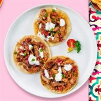 Al Pastor Tacos (3X) · Spit roasted marinated pork, pineapple with guacamole & pico de gallo, cilantro, onion, your...