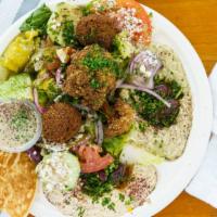 Mixed Vegetables Platter · Baba ghanoush falafel, hummus, pita and greek salad.