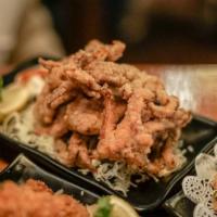 Ika Geso Kara-Age · Deep-fried squid tentacle. Served with lemon, shichimi powdered tartar sauce.