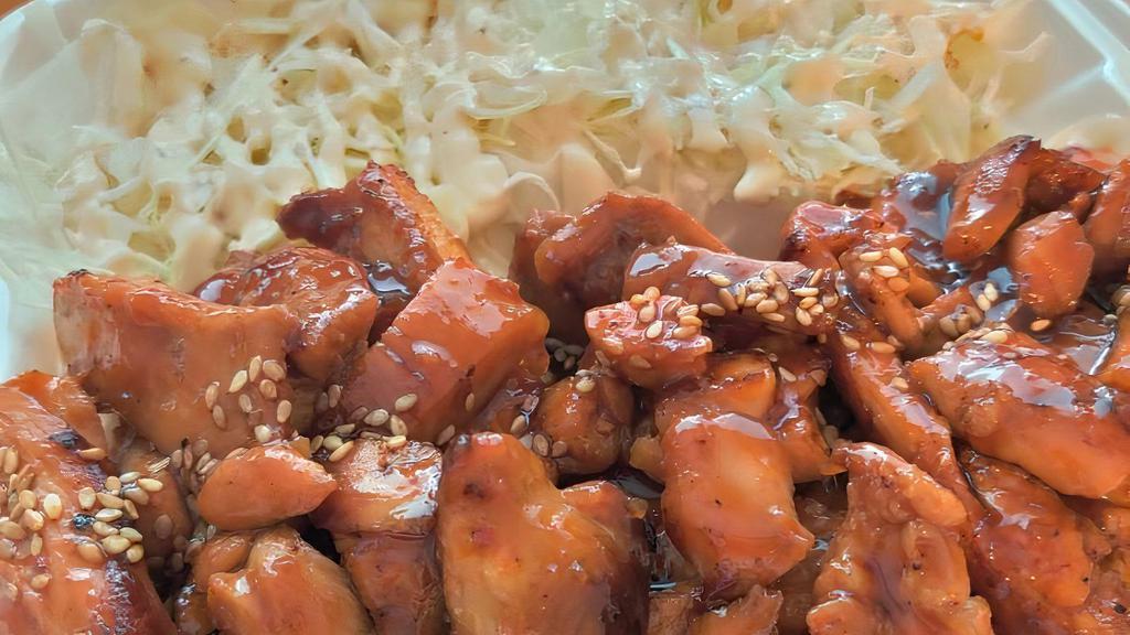 Spicy Chicken Teriyaki · Spicy. Stir-fry grilled chicken with a house made spicy sauce topped with teriyaki sauce ,sesame seeds. Served with a cabbage salad and rice.