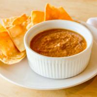 Almond-Arbol Salsa · Roasted tomatoes, onion, garlic, chile de arbol, almonds, salt.  with side of chips
