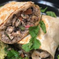 Burrito · Choice of meat, rice,beans,cilantro,onions,& taco sauce
