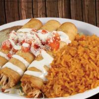 #15 Flautas (2 Pcs.) · Two grilled fried rolled flour tortillas stuffed with shredded chicken or shredded beef, top...