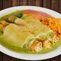 Enchiladas Suizas · With your choice of chicken or ground beef, smothered with green tomatillo sauce, cheese and...