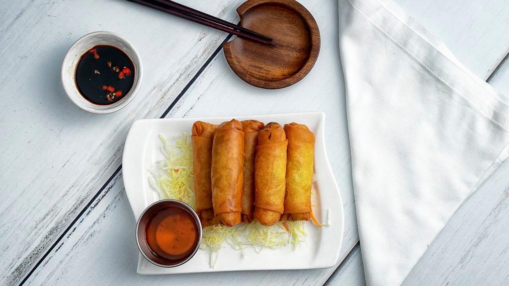 Spring Rolls · Deep fried mixed vegetables wrapped in an egg roll wrapper, served with plum sauce.
