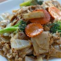 Drunken Noodles (Pad Kee Mao) · Pan-fried wide rice noodles in chili sauce with basil, broccoli, mushrooms, bamboo shoots, b...