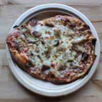 Fort Worth Pizza · Pork burnt ends, honey, crushed tomato, mozzarella