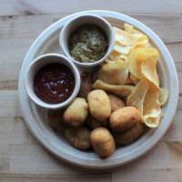 Corn Dogs · Mini corn dogs with chips and dipping sauce.