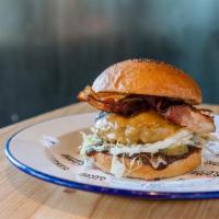 Paris Burger · grass fed beef, apple bbq sauce, smoked bacon, cheddar cheese, lettuce, dill pickle.. All bu...