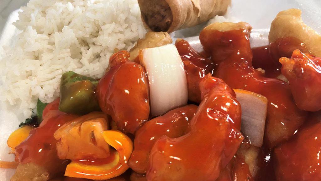 Sweet & Sour Chicken · Sliced chicken marinated in a sweet & sour sauce with pineapple, carrot, white onion, green bell pepper, and ginger.
