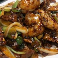 House Mongolian (Spicy) · Sliced flank steak, chicken, and shrimp marinated in a sweet soy glaze with garlic, green on...