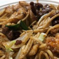 House Lo Mein · Lo mein noodles with sliced flank steak, shrimp, chicken, white onion, green onion, and cabb...