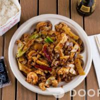 House Kung Pao (Spicy) · Sliced flank steak, chicken, and shrimp sautéed with chili pepper, yellow onion, celery, wat...