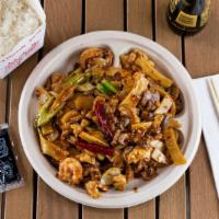 Kung Pao Shrimp (Spicy) · Sliced shrimp sautéed with chili pepper, yellow onion, celery, water chestnuts, bamboo shoot...