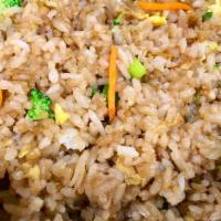 Fried Rice With Vegetables · Stir-fried rice with chunks of carrot, broccoli, green onions, garlic, sesame oil, soy sauce.