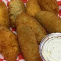Jalapeños Poppers  · Cream cheese filed jalapeños and battered and fried.