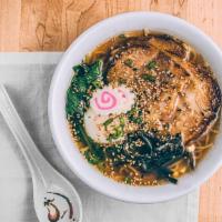 Shoyu Ramen · Dashi-Chicken broth, soy sauce base, chasu, poached egg, fish cake, spinach, fungus.