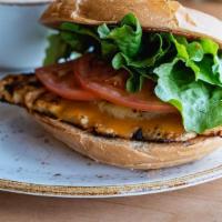 Veggie Burger · Lettuce, tomato, grilled onion, Galos sauce, and veggie patty.