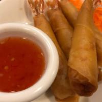 Shrimp Roll (4) · Fried shrimp wrapped in a crispy wonton shell. Served with our sweet and chili sauce.