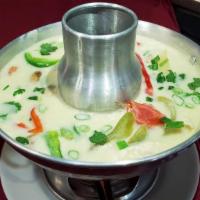 Tom Kha (Coconut Soup) · Thai coconut with galangal, mushrooms, onions, baby corn, tomatoes, lemon grass, bell pepper...