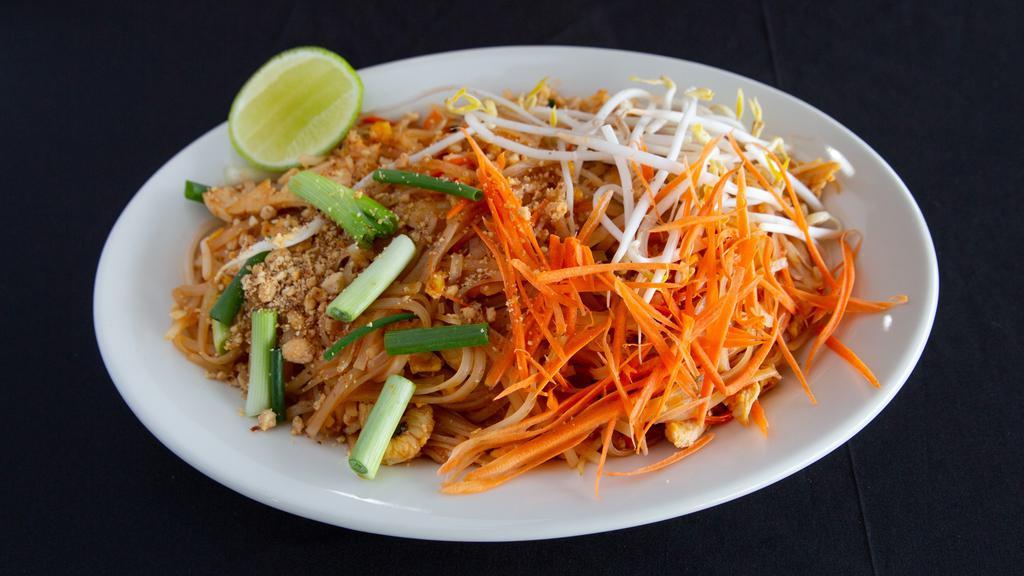 Pad Thai · Stir fried rice noodles consisting of your choice of meat, carrots, bean sprouts, green onions, peanuts, and a sweet and savory pad thai sauce.