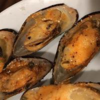 Creamy Mussels · 6 pieces of half shell green mussels topped with special creamy sauce.