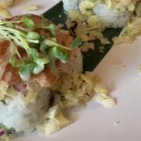 Garden Crunch Roll · Cucumber, imitation crab and shrimp tempura topped off with fresh greens, tempura crumbs and...