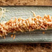Golden California Roll · Deep-fried California roll topped off with imitation crab, tempura crumbs and a sweet sauce.
