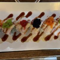 Temptation Roll · Shrimp tempura, avocado and cucumber topped off with imitation crab, 3 kinds of tobiko, temp...