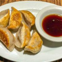 Pot Sticker (6) · Dumpling with pork and napa cabbage, then pan-fry perfection.