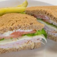 Classic Turkey Sandwich · Simply satisfying this traditional sandwich comes with our freshly baked turkey, provolone c...