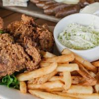 Fried Chicken · Choice of dark meat thighs, or white meat breasts, served with house slaw and a side