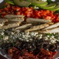 Cobb Salad · Fresh salad mix topped with grilled chicken, egg, tomato, avocado, ble cheese crumbles, baco...
