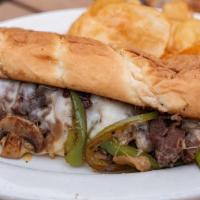 Coopers Philly · Roast beef, caramelized onionsss, mushrooms, and green peppers, topped with provolone