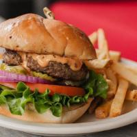 Classic Burger · 6 oz hand-pressed chuck brisket patty with house seasoning, lettuce, pickle, tomato, onion, ...