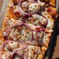 Bbq Chicken Flatbread · House-made BBQ, chicken, bacon, onions, and cheese