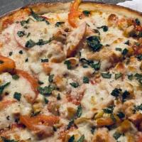 Margherita Pizza · Sliced Roma tomatoes, fresh mozzarella, basil, garlic, fresh marinara sauce and Parmesan.