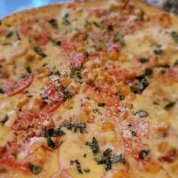 Pollo Fresca Pizza · Chicken, tomato, garlic, basil, light tomato sauce and provolone cheese dressed with garlic ...
