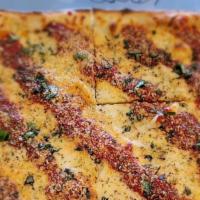Grandma Sadie Pizza · 16x16 - thin crust Sicilian style with basil, mozzarella cheese, fresh marinara sauce, orang...