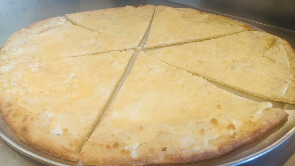 Bianca Pizza · Ricotta, mozzarella and Parmesan cheese dressed with garlic oil.