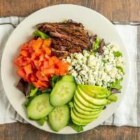 Black And Bleu Steak Salad · Gluten Free. Blacked marinated flank steak cooked to your specifications, served on a mixed ...