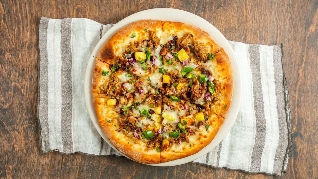Bbq Pulled Pork Pizza · House made tangy BBQ sauce with succulent shredded pork, cilantro, fresh pineapple and jalapenos.